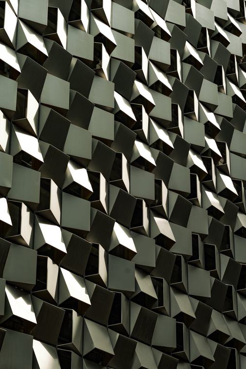 Façade reduced to light and shadow