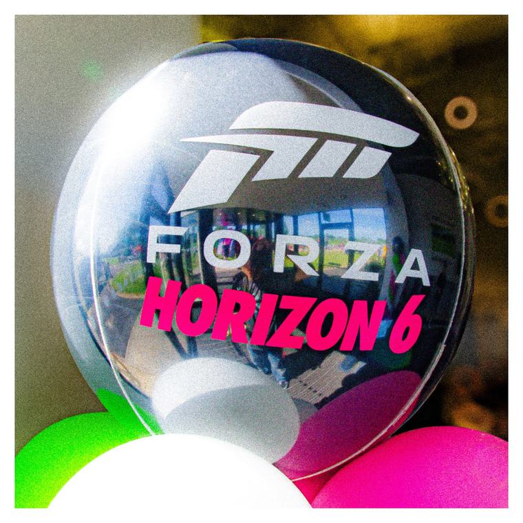 A launch balloon, and the room reflected in it