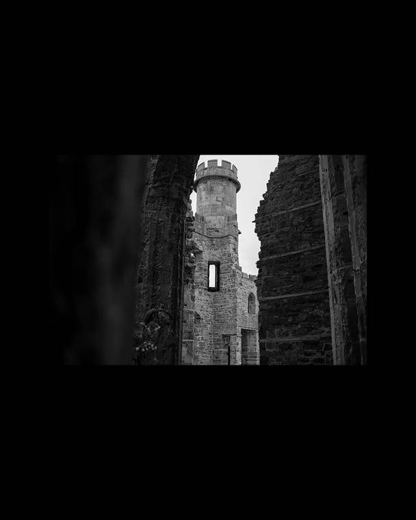 The tower, framed by what fell down around it