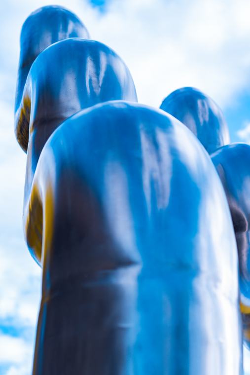 Blue forms, one behind the other