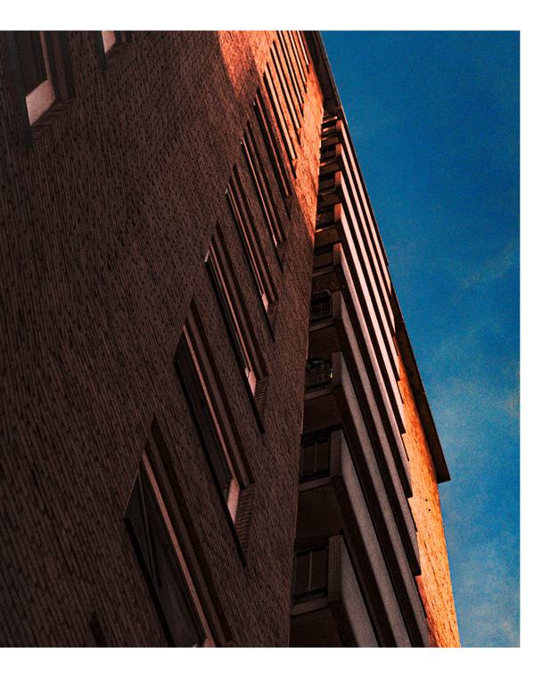 Brick corner against a hard blue