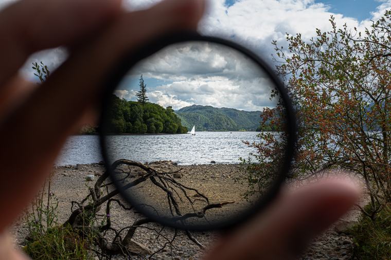 The lake through a filter, held up by hand