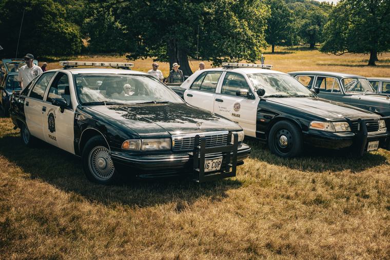 A row of retired police cars