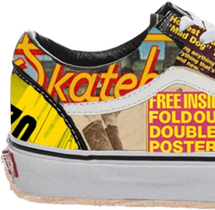 Detail — cover lines and fold-out poster flashes wrapping the heel