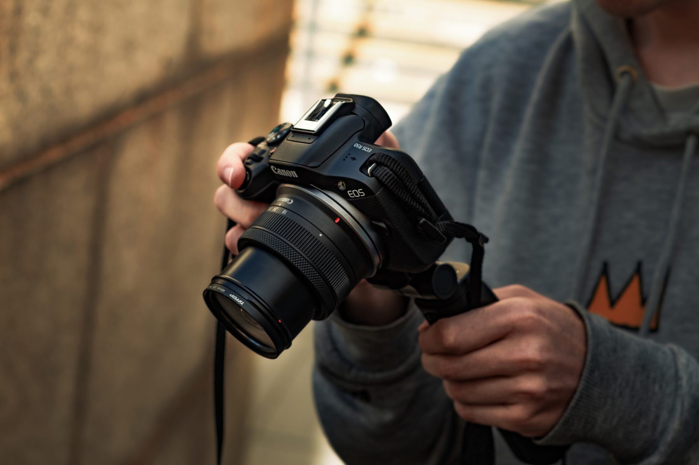 The camera, in hand